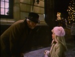 A young caroler says "I love you, Mr. Krueger" after inviting him to sing with them.