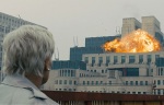 M watches helplessly as MI6 headquarters is destroyed in an explosion