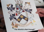 The Bond family crest with the words that translate into The World Is Not Enough.