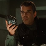 Major Stryker is holding a compound that is eventually used to form an extremely hard metal known as Adamantium.