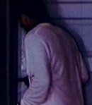 Michael attempts to break down the door his wife and daughter are hiding behind.