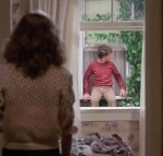 We see Eric sitting in the second-floor window of Millie’s bedroom and, without cutting, the camera looks away from him for a few seconds and when it turns back we see him sitting 20 feet away in his own window.