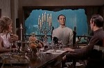 Dr. No treats his two prisoners to a fancy meal with him.