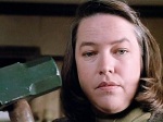 Annie Wilkes is a deranged fan who tries to knock sense into her favorite author.