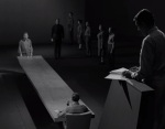 A librarian is condemned to die for believing in God in The Obsolete Man.
