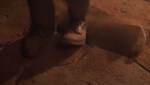 The floor gives way beneath Indiana Jones's feet.